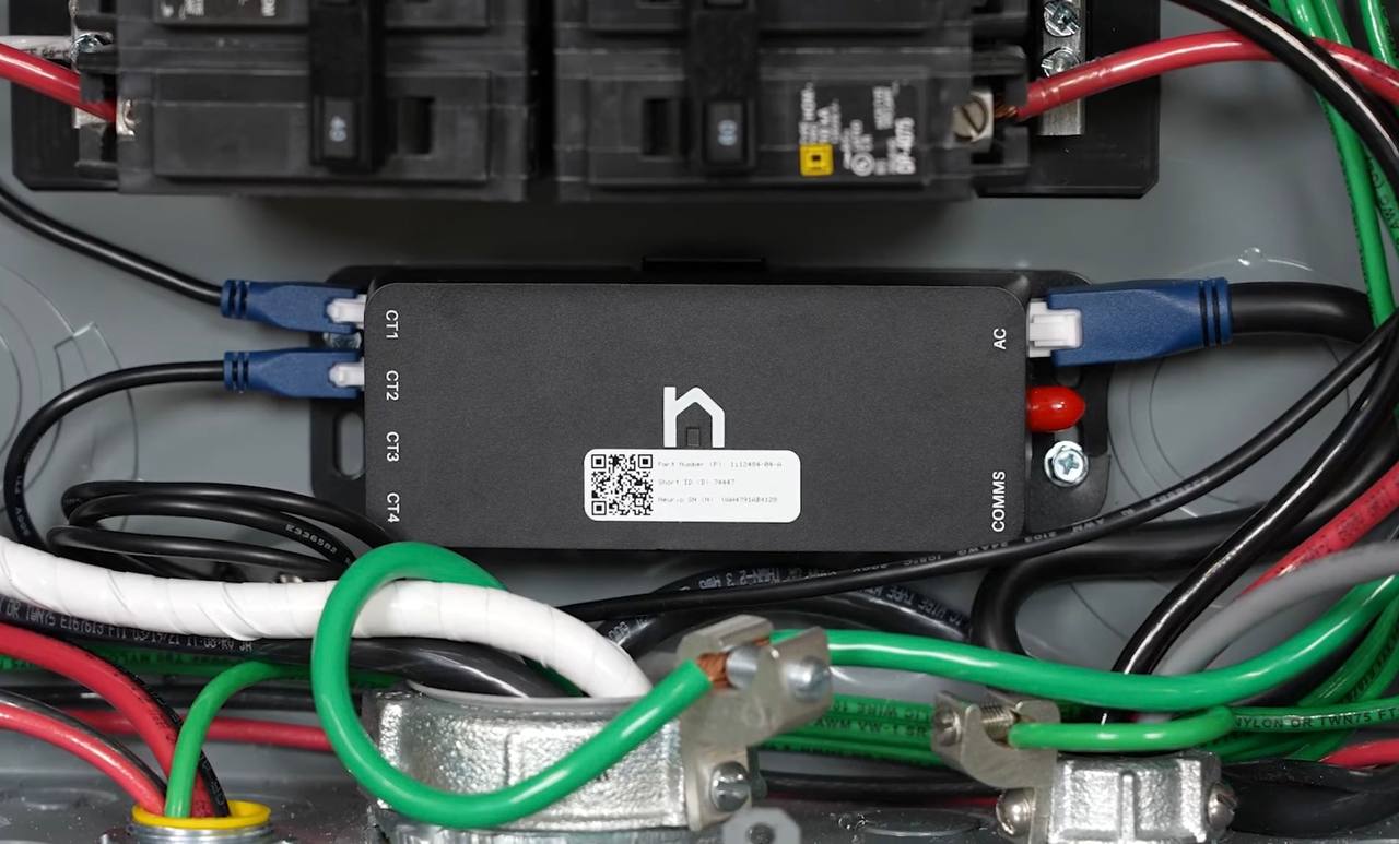 Tesla Neurio energy meter mounted inside the electrical panel for Dynamic Power Management